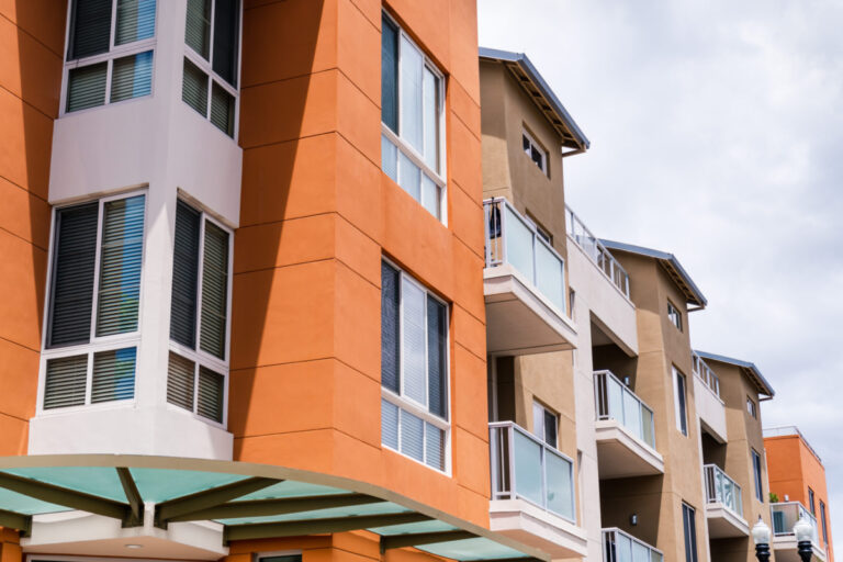 Exterior view of modern apartment building offering luxury rental units; San Francisco bay area, California